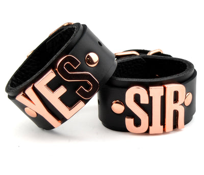 Black & Rose Gold Leather Wrist Cuffs - 'Yes Sir' | BDSM Cuffs